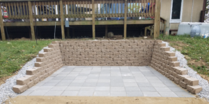 Retaining wall and pavers